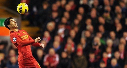 Liverpool's Luis Suarez controls the ball during their match against Sunderland, in Liverpool, on January 2, 2013